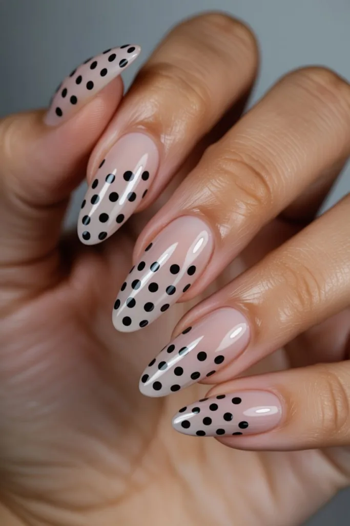 This vertical dot gradient is a fresh twist on traditional polka dot nail ideas — sleek, stylish, and modern.
